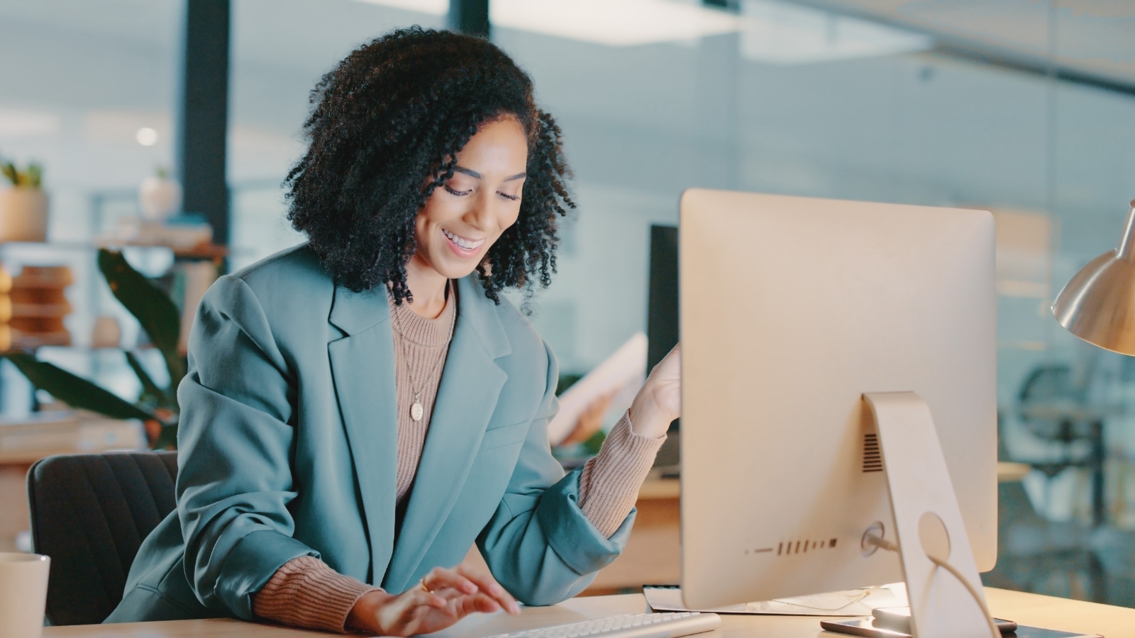 July 4 blog Young female business woman reading laptop